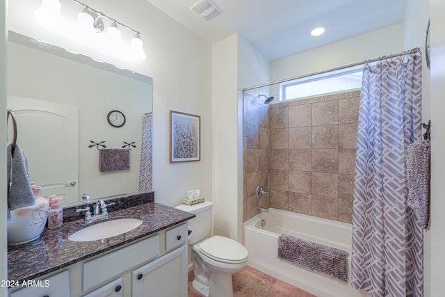 full bathroom with vanity, toilet, tile patterned floors, and shower / bath combo with shower curtain