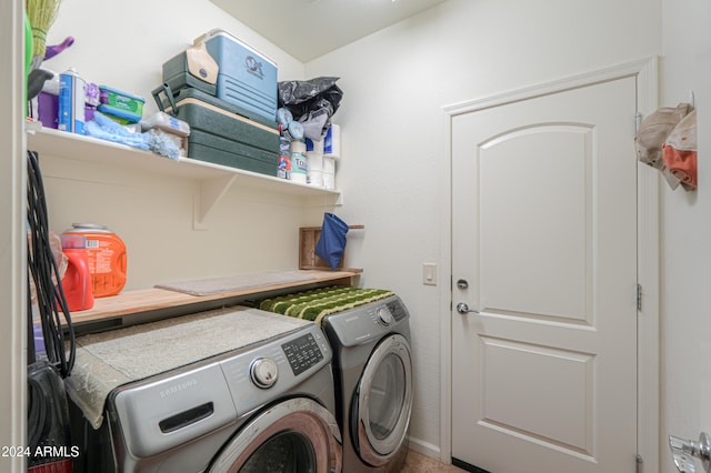 laundry room featuring washing machine and dryer