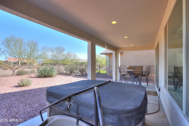 view of patio with outdoor dining space and a fenced backyard