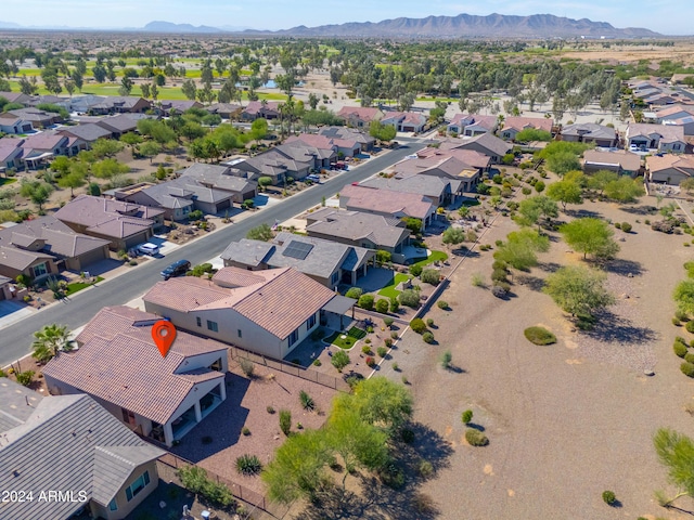 birds eye view of property with a mountain view and a residential view