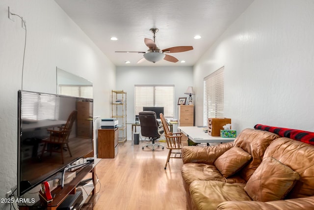 office space featuring light wood-style floors, ceiling fan, and recessed lighting