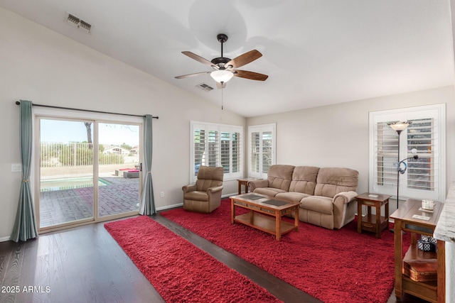 living room featuring wood-type flooring, lofted ceiling, and ceiling fan