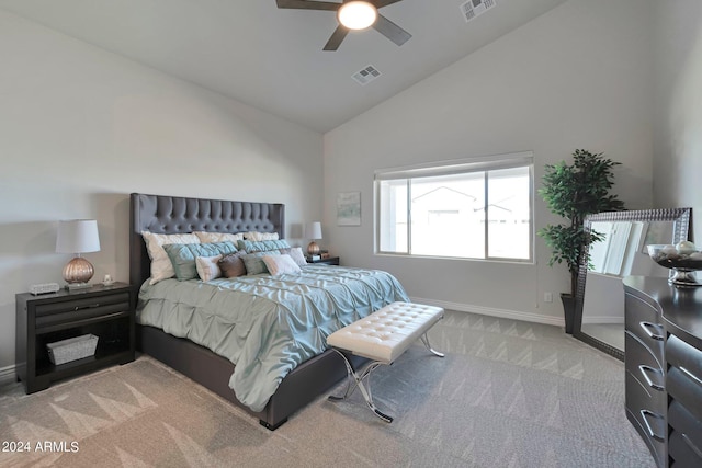 carpeted bedroom with high vaulted ceiling and ceiling fan