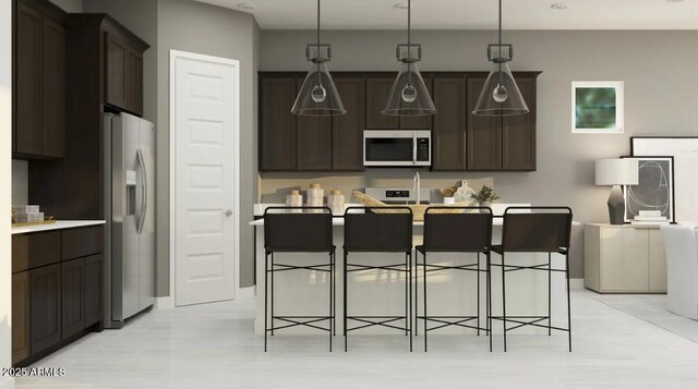 25169 N 177th Dr, Surprise, AZ 85387 - kitchen with white microwave, stainless steel refrigerator with ice dispenser, dark brown cabinets, and a kitchen island with sink