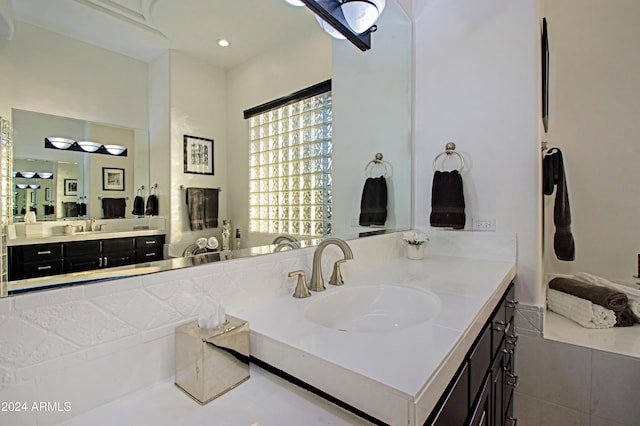 bathroom featuring tile patterned floors and vanity