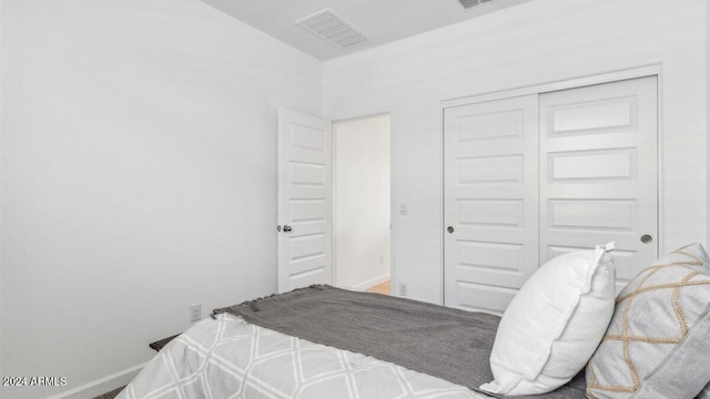 38100 W Bello Ln, Maricopa, AZ 85138 - bedroom featuring a closet and baseboards