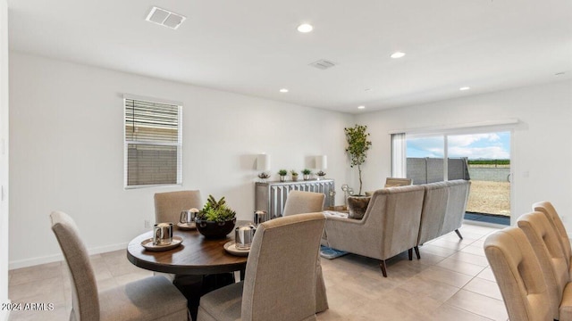 38100 W Bello Ln, Maricopa, AZ 85138 - dining room with recessed lighting, light tile patterned floors, and baseboards