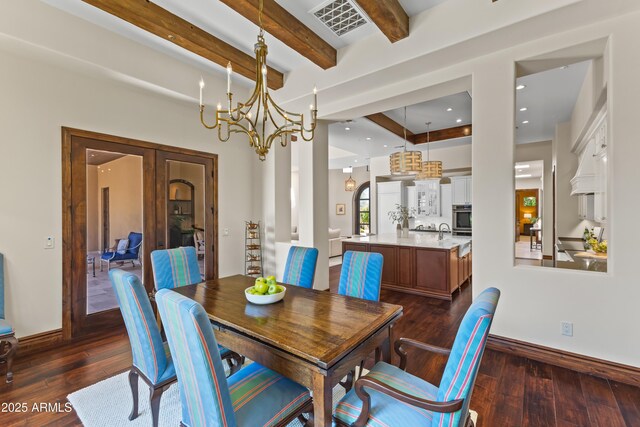 37334 N Winding Wash Trl, Carefree, AZ 85377 - dining area featuring baseboards, dark wood finished floors, and visible vents