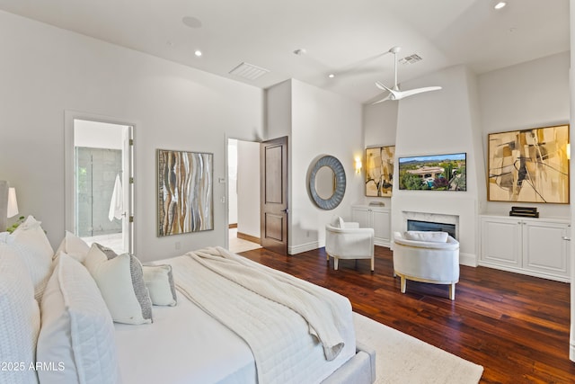 37334 N Winding Wash Trl, Carefree, AZ 85377 - bedroom featuring high vaulted ceiling, visible vents, recessed lighting, and dark wood-type flooring