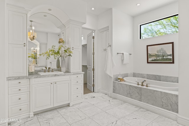 37334 N Winding Wash Trl, Carefree, AZ 85377 - bathroom featuring vanity, recessed lighting, marble finish floor, and a bath