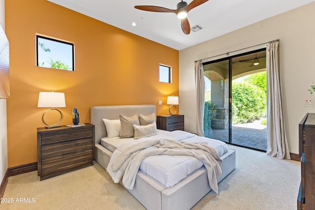 37334 N Winding Wash Trl, Carefree, AZ 85377 - bedroom with ceiling fan, light colored carpet, access to exterior, baseboards, and visible vents