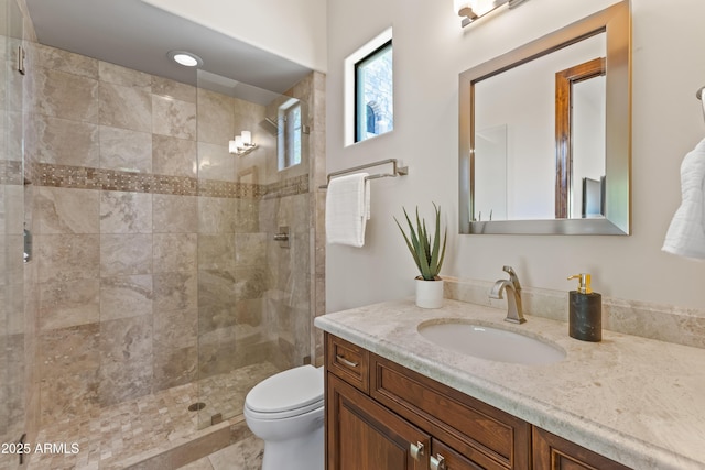 37334 N Winding Wash Trl, Carefree, AZ 85377 - full bathroom with vanity, toilet, and tiled shower