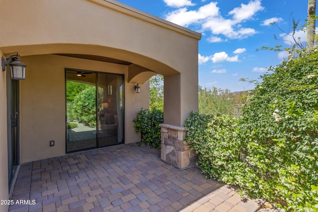 37334 N Winding Wash Trl, Carefree, AZ 85377 - property entrance with a patio area and stucco siding