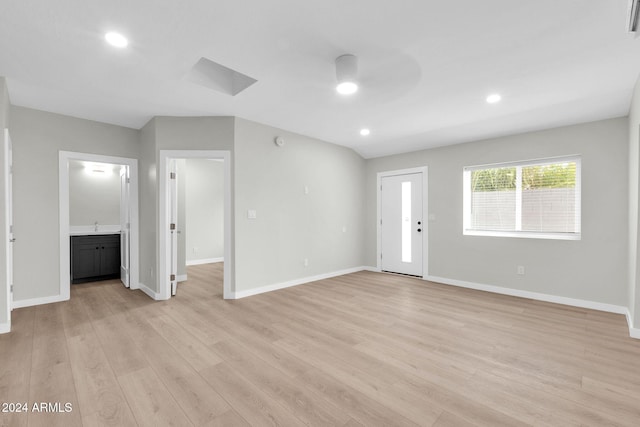 interior space featuring ceiling fan and light wood-type flooring