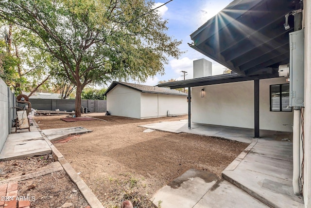 view of yard with a patio area