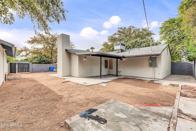 rear view of house featuring a patio area