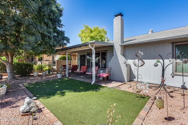 view of yard with a patio area