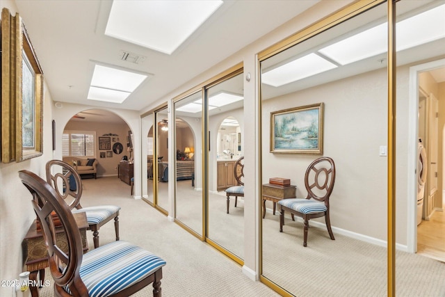 sitting room with light carpet