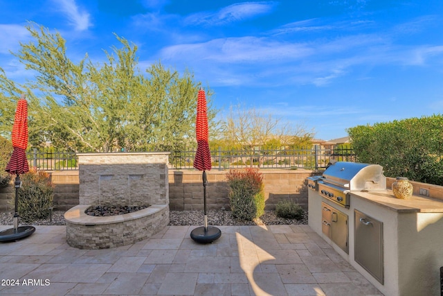 view of patio / terrace with a grill and area for grilling