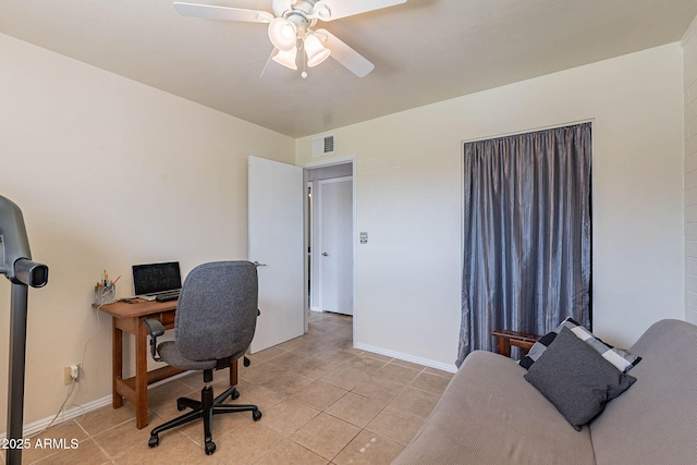 office space with light tile patterned flooring and ceiling fan