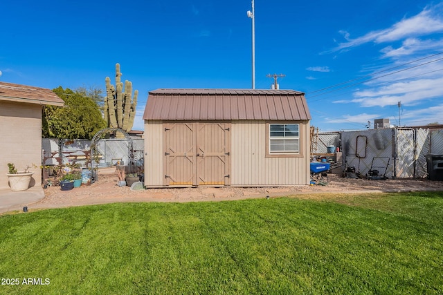 view of outdoor structure featuring a yard