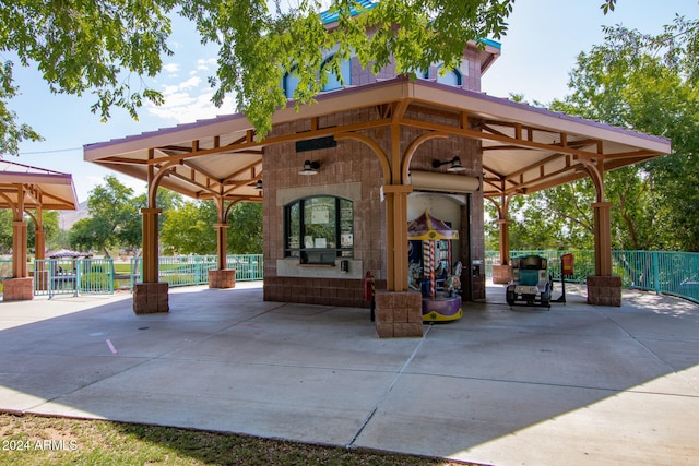 view of home's community with a patio and a gazebo