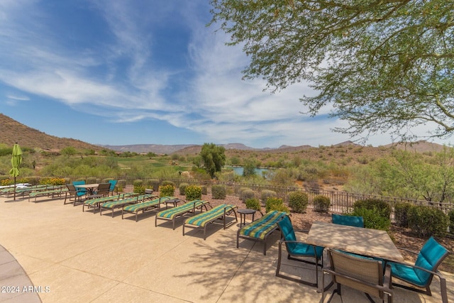 view of patio / terrace with a mountain view