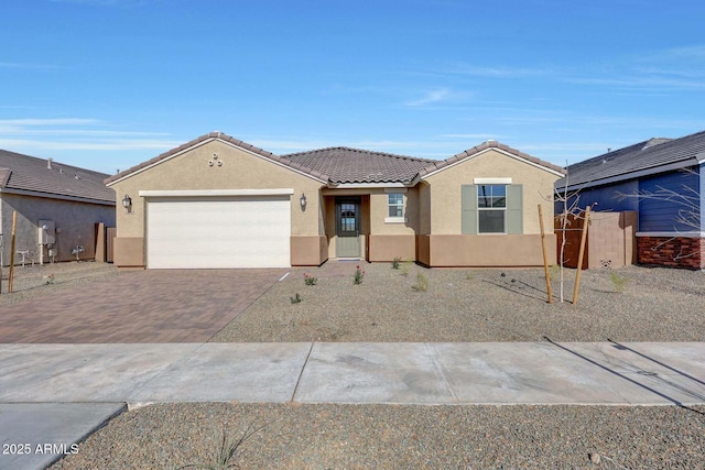 view of front of property featuring a garage