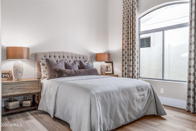 bedroom with light hardwood / wood-style floors