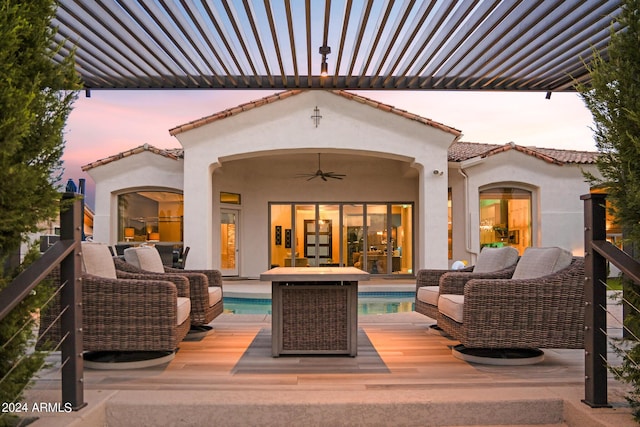 exterior space featuring ceiling fan, outdoor lounge area, and a pergola