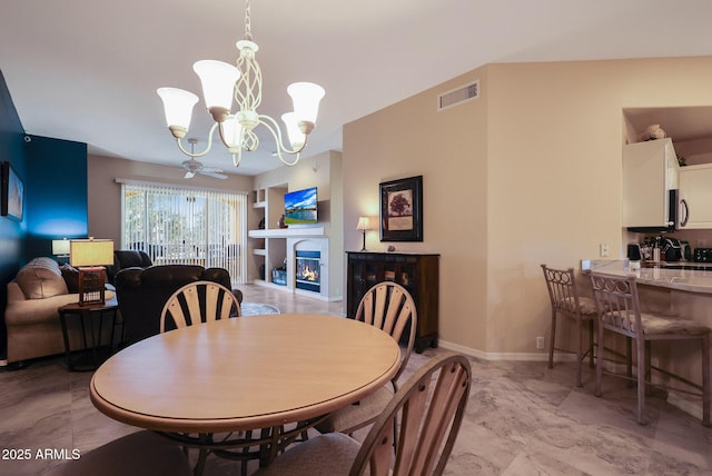 dining area with a notable chandelier