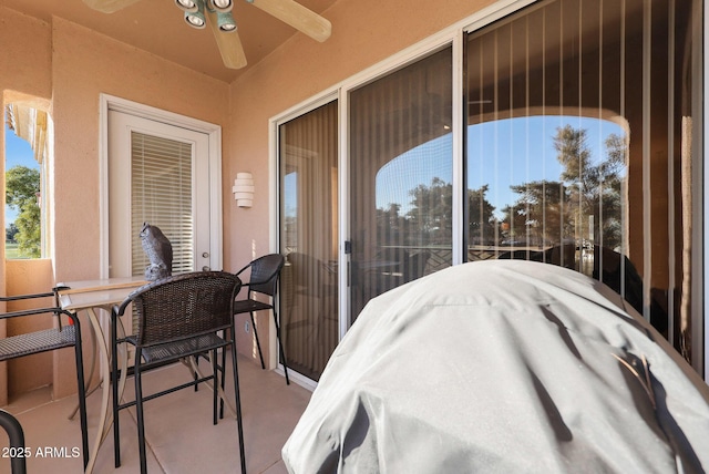 view of patio with ceiling fan