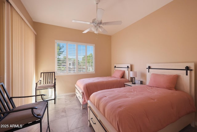 tiled bedroom with ceiling fan