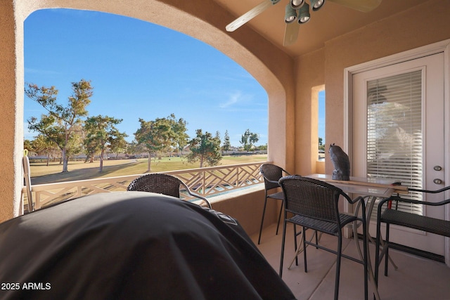 balcony featuring ceiling fan