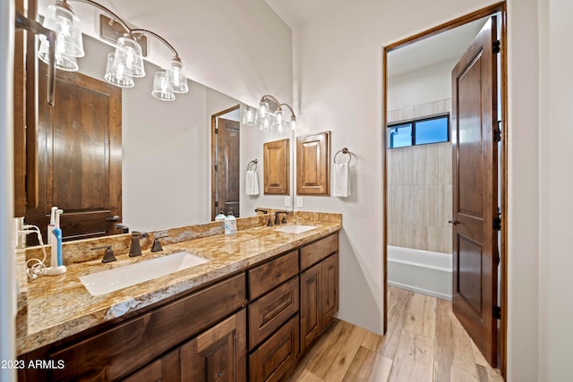 bathroom featuring vanity and wood-type flooring