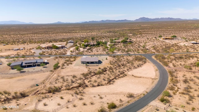 birds eye view of property featuring a mountain view