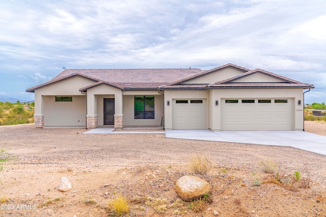 view of front of property featuring a garage