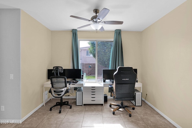 office space with ceiling fan and light tile patterned flooring