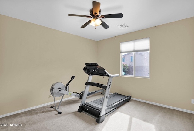 workout room featuring carpet flooring and ceiling fan