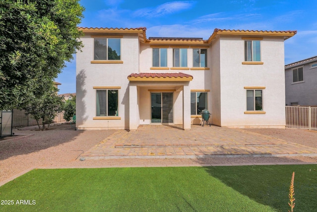 back of property with a patio area