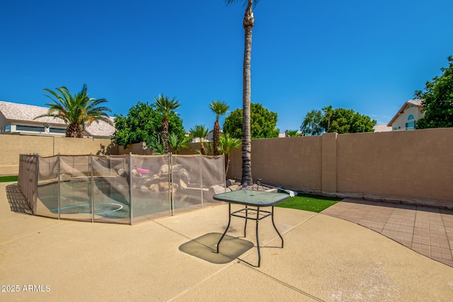 view of patio with a fenced backyard