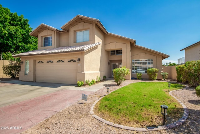 view of front of property featuring driveway, an attached garage, a tiled roof, and stucco siding