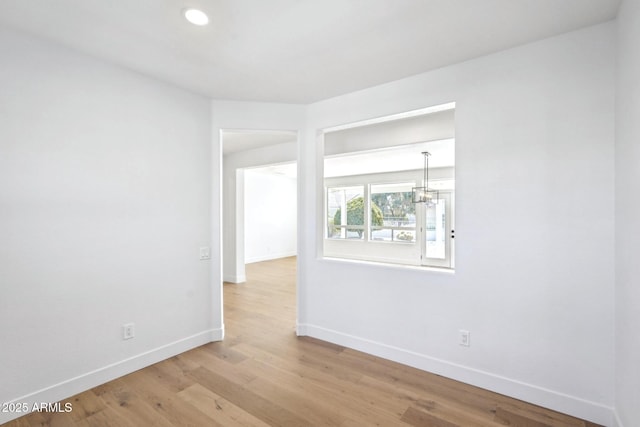 empty room with light wood-type flooring