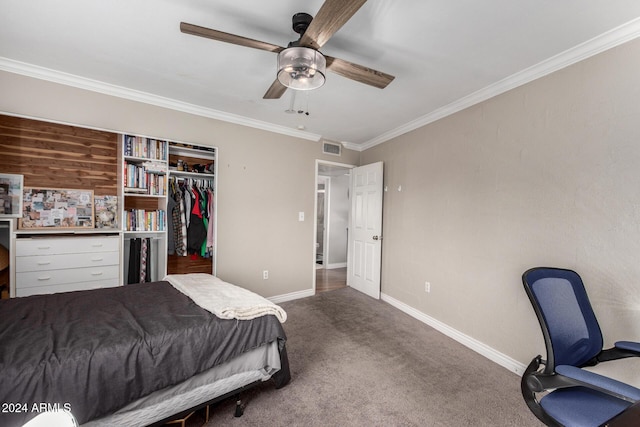 bedroom featuring ceiling fan, a closet, crown molding, and carpet flooring