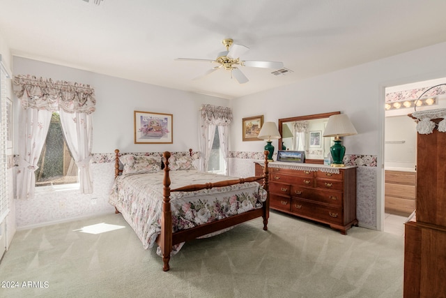 bedroom featuring ceiling fan and light colored carpet