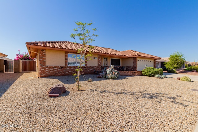 view of front of home with a garage