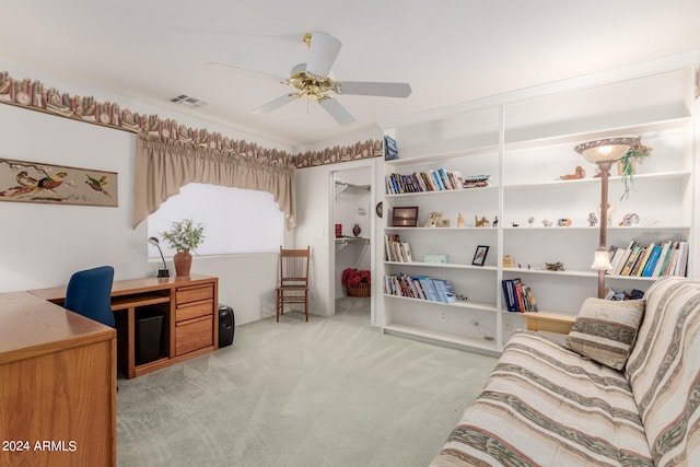 office with ceiling fan and light colored carpet