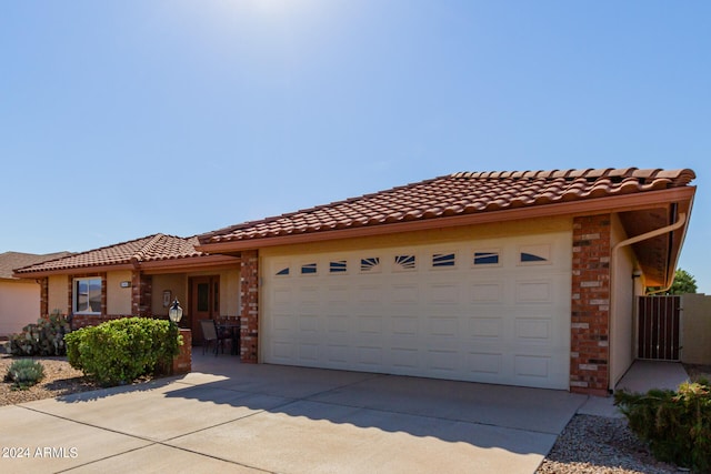 view of front of home with a garage