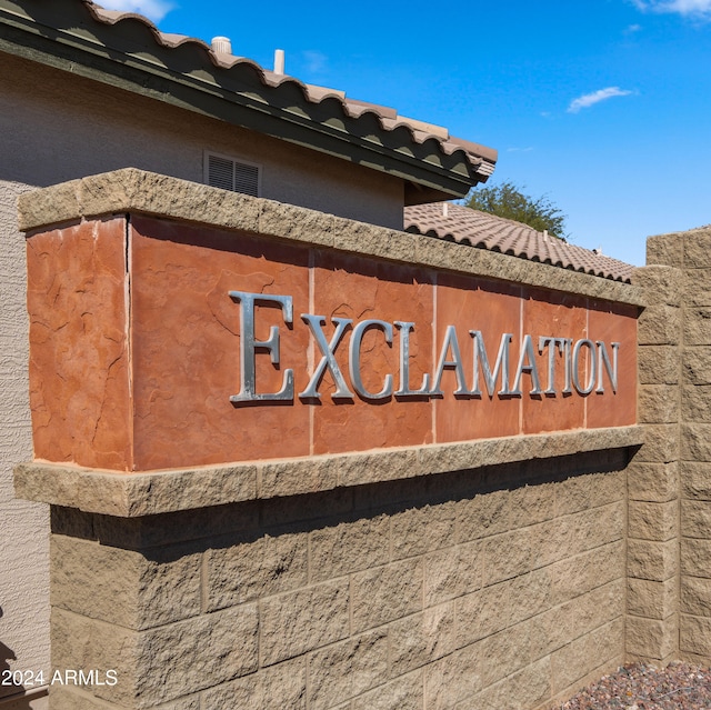 view of community sign