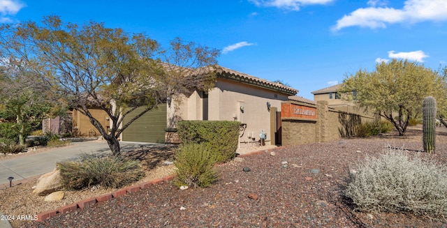 view of home's exterior featuring a garage